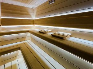 a sauna with two beds and two towels at Sundia By Liberty Oludeniz in Oludeniz