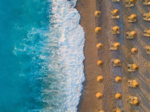 an overhead view of a beach with the ocean at Sundia By Liberty Oludeniz in Oludeniz