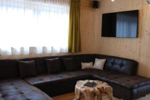 Posezení v ubytování Chalet Glemmtal - Haus Schmittenblick