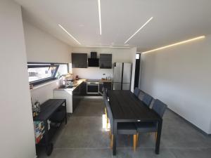 Kuchyň nebo kuchyňský kout v ubytování SPA Apartment Vito