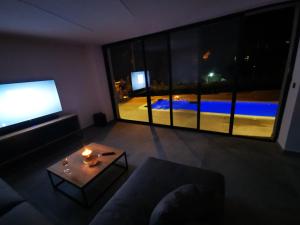 TV a/nebo společenská místnost v ubytování SPA Apartment Vito