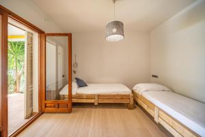 Postel nebo postele na pokoji v ubytování Villa Veronica