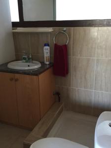 a bathroom with a sink and a toilet at Studio with view in Polis area in Paphos City