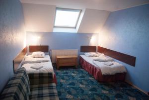 Ένα ή περισσότερα κρεβάτια σε δωμάτιο στο Terve Hostel