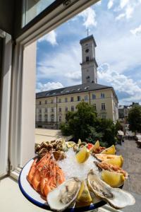 Gallery image of Oysters & Bubbles Gastro Hotel. Rynok square in Lviv