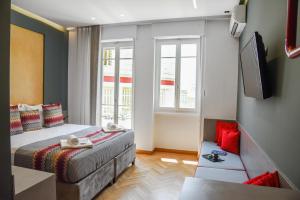Posteľ alebo postele v izbe v ubytovaní CentraL44 WoW CasuaL Suite-Ermou view