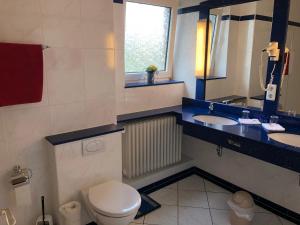 Koupelna v ubytování Hotel Haus am Rieth