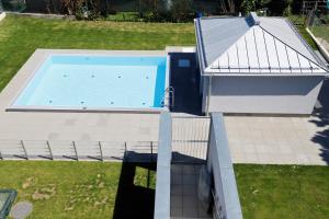 The swimming pool at or close to Rooftop Terrace, free garage parking and Pool!