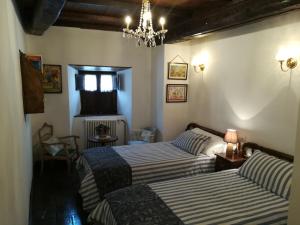 Postel nebo postele na pokoji v ubytování Las 3 Negrillas