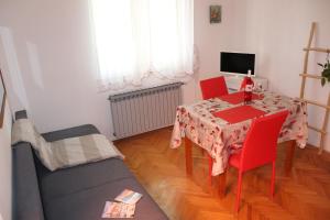 TV a/nebo společenská místnost v ubytování Aleta