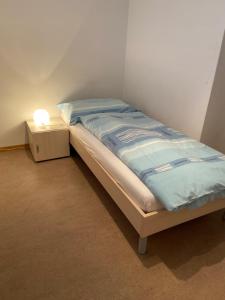 Ein Bett oder Betten in einem Zimmer der Unterkunft Serviced Apartments Haus 2