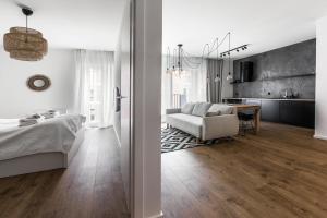 Posteľ alebo postele v izbe v ubytovaní City Break Gdańsk Rajska 8 Apartamenty