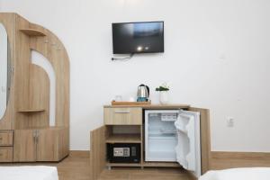 TV a/nebo společenská místnost v ubytování Vila ANY