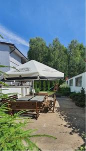 Κήπος έξω από το Dom Wypoczynkowy Oliwka