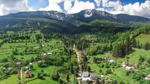 an aerial view of a small village in the mountains at Casa Dana in Borsa