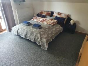 A bed or beds in a room at Apartmán v centre mesta
