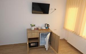TV a/nebo společenská místnost v ubytování Vila ANY