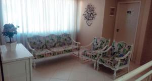 Posezení v ubytování Hotel Domo