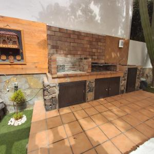 A kitchen or kitchenette at Corralejo Garden&Relax
