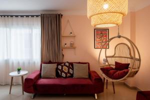 Posezení v ubytování The 2BDR Compelling Condo 5 min to CAI Airport