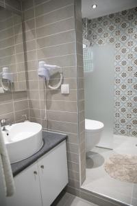 O baie la Alex Studios & Apartments
