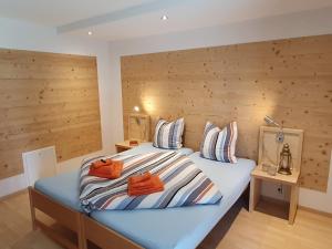 Postel nebo postele na pokoji v ubytování Silberblick "Chilcheri" - aussergewöhnlich & familienfreundlich