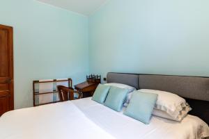 Ліжко або ліжка в номері Villa Vallone Apartment