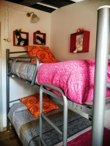 a group of bunk beds in a room at ATICO Loli in Berga