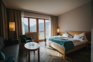 Łóżko lub łóżka w pokoju w obiekcie G'sund & Natur Hotel Die Wasnerin - Adults Only