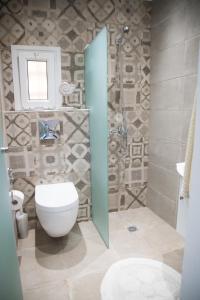 O baie la Alex Studios & Apartments