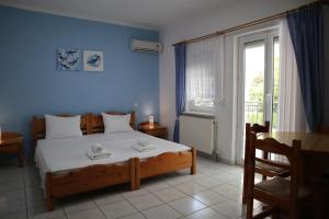 Posteľ alebo postele v izbe v ubytovaní Delphin Rooms Sivota