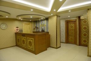 a large room with a counter and a room withdoorsangering at Ayder Resort Hotel in Ayder Yaylasi