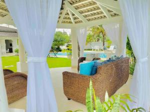 Χώρος καθιστικού στο Villa Jardim Acapulco - Guarujá - Praia de Pernambuco
