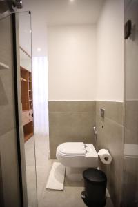 Um banheiro em Unhotel - Aluguel de Temporada Avenida Atlantica, Posto 6 - Praia de Copacabana