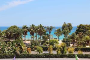 a view of the beach from the resort at Hotel Bulla Regia in Fontane Bianche