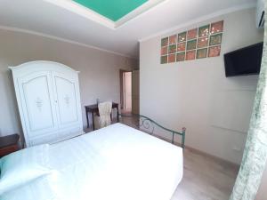 A bed or beds in a room at Casa Sofia
