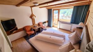 Una cama o camas en una habitación de Hotel Cresta
