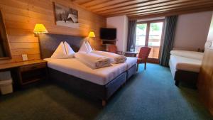 Una cama o camas en una habitación de Hotel Cresta