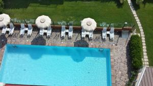 Bazén v ubytování Hotel Benini nebo v jeho okolí