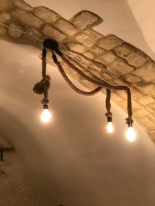 Fotografie z fotogalerie ubytování Il Galletto Viola, luxury room & suite v destinaci Palazzolo Acreide