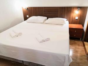 Postel nebo postele na pokoji v ubytování Guesthouse Villa Paškal