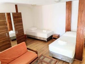 Postel nebo postele na pokoji v ubytování Guesthouse Villa Paškal