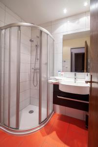 Ванная комната в Hotel Garni Brigitte