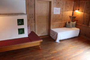 Cama o camas de una habitación en Ferienhaus Steinau