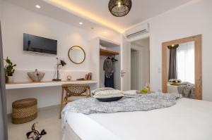 Sea & Olives Suites Hotel and Villas客房内的一张或多张床位
