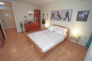Voodi või voodid majutusasutuse Apartment Elvis toas