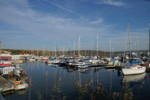 a marina filled with lots of small boats at Warias Hotel & Restaurant in Braunsbedra