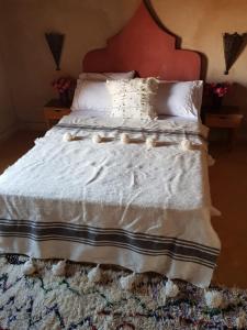 Cama o camas de una habitación en Kasbah Erg Chebbi