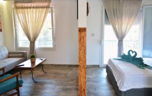 Postel nebo postele na pokoji v ubytování Kartalia apartment