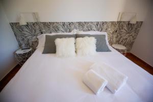 Postel nebo postele na pokoji v ubytování Hotel El Molino
